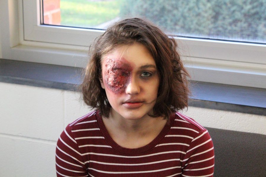 Rachel Podhajsky 21 poses with gruesome eye makeup.  