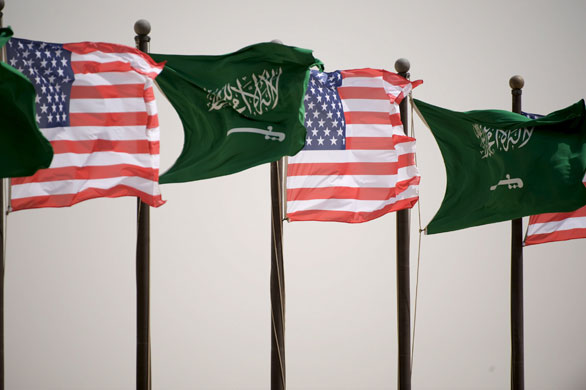 US and Saudi flags fly together at the King Khalid International Airport. Photo by Matthew Cavanaugh from EPA used with permission.
