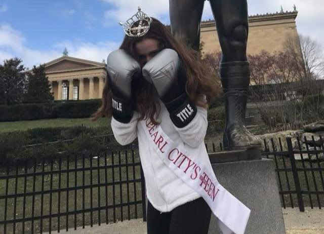 Elise Seery in front of Rocky statue in Philadelphia. 