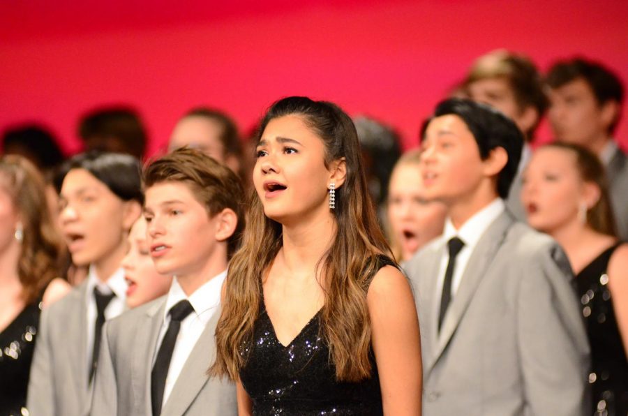 A featured image of the varsity City High Show Choir while preforming their stunning ballad. 